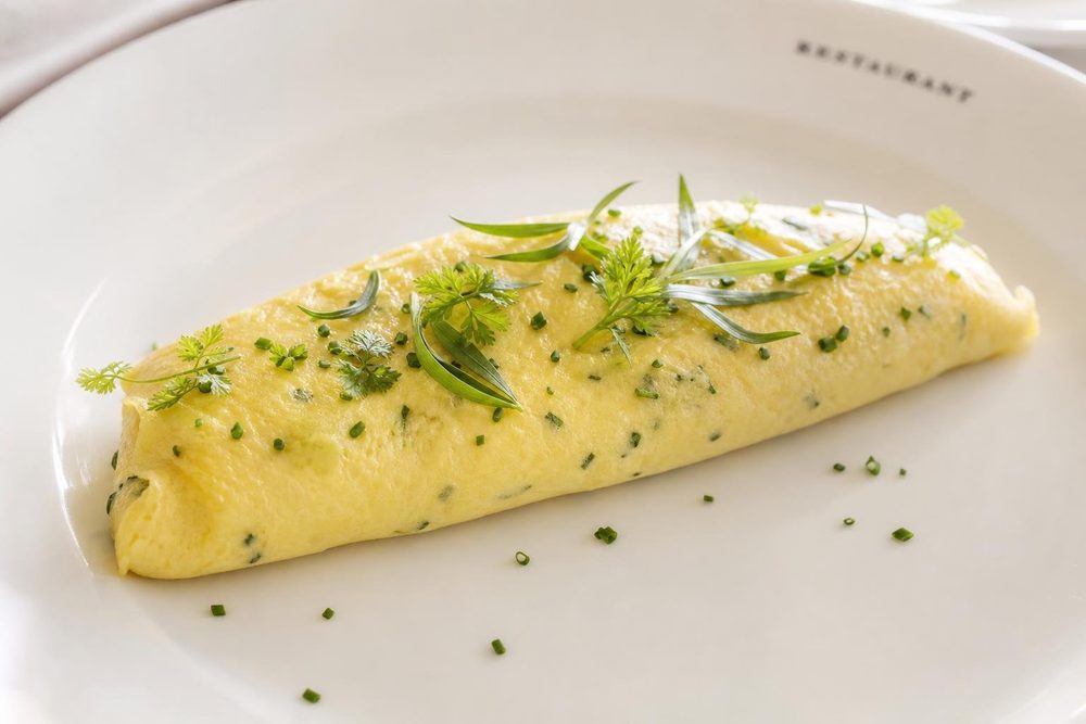 Omelette aux Fines Herbes, plated and ready to serve