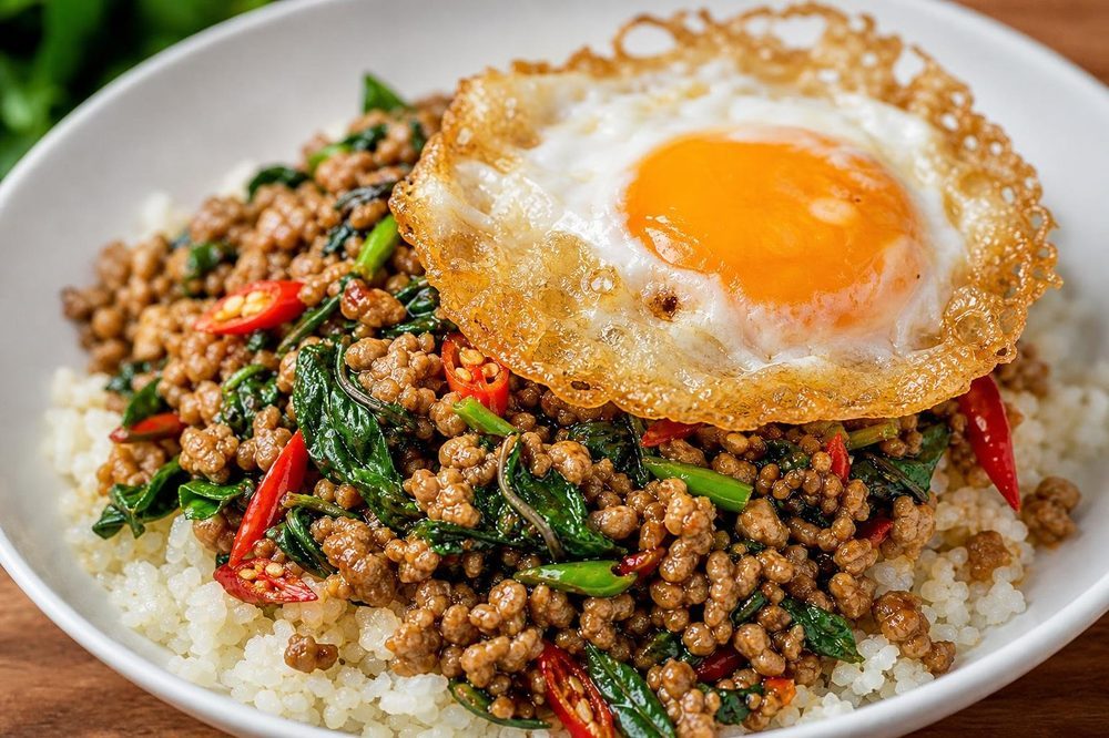 Pad Krapao Moo Breakfast Bowl, plated and ready to serve
