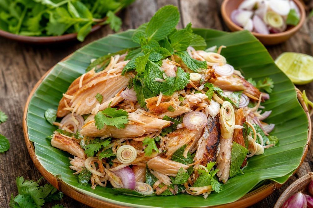 Smoked Fish Salad Yam Pla Chon, plated and ready to serve