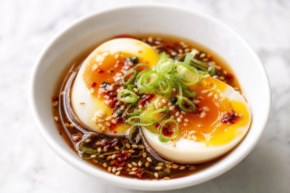 Kai Luak Soft Boiled Eggs with Soy Ginger, plated and ready to serve