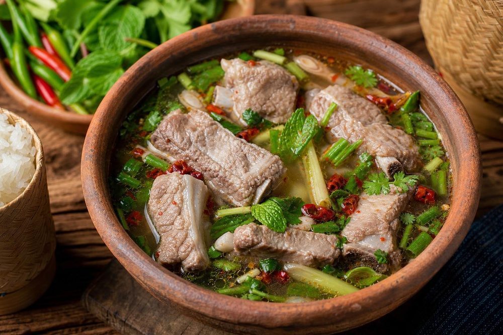 Tom Saap Isan Spicy Pork Rib Soup, plated and ready to serve