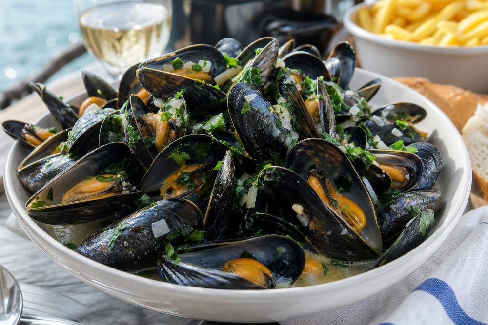 Moules Marinières Vin Blanc, plated and ready to serve