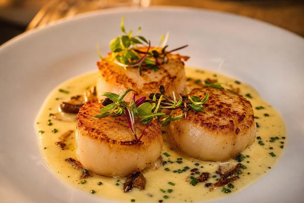 Coquilles Saint Jacques Poêlées, plated and ready to serve