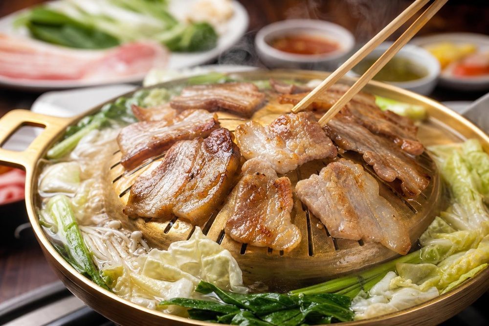 Moo Krata Thai BBQ Pork Belly, plated and ready to serve