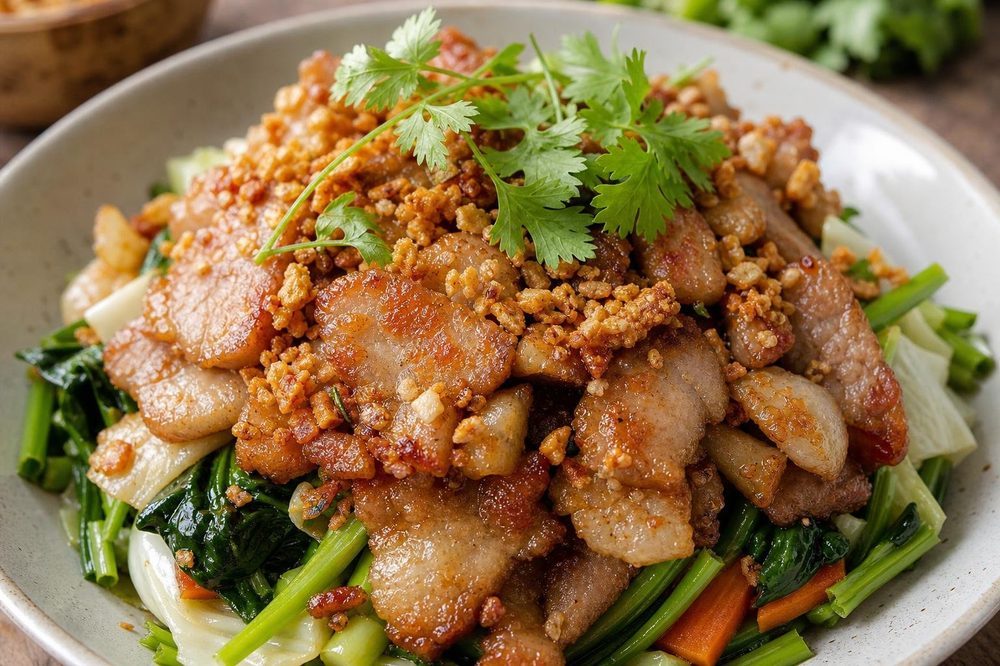 Moo Tod Kratiem Garlic Fried Pork, plated and ready to serve
