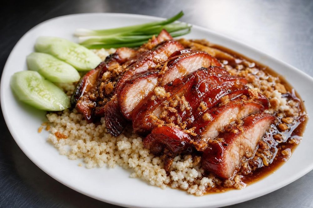Khao Mu Daeng Red Pork Cauliflower Rice, plated and ready to serve