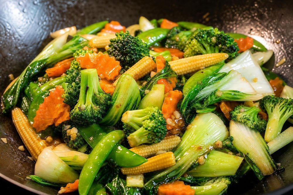 Pad Pak Ruam Mixed Vegetables Oyster Sauce, plated and ready to serve