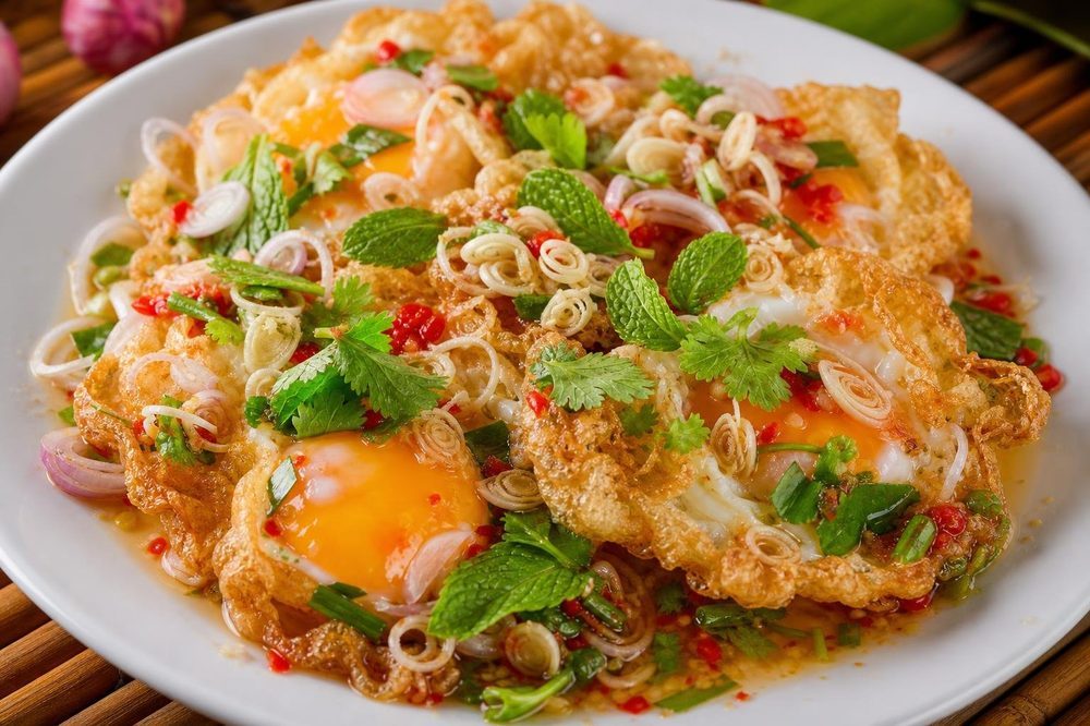 Yam Khai Dao Fried Egg Salad, plated and ready to serve