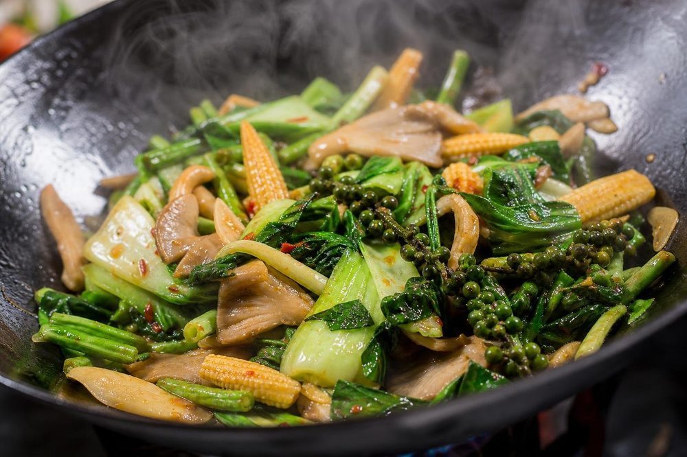 Pad Cha Pak Stir Fried Vegetables Wild Ginger, plated and ready to serve