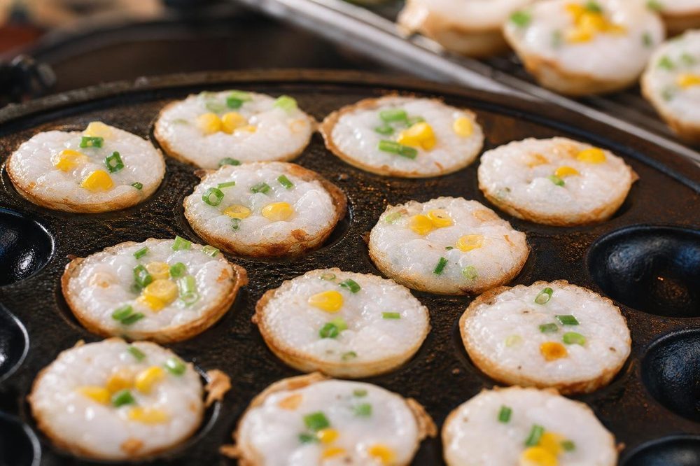 Khanom Krok Coconut Pancake Bites, plated and ready to serve