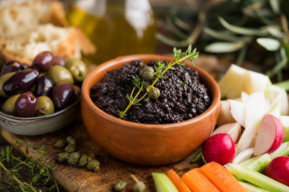 Tapenade Noire Olives, plated and ready to serve