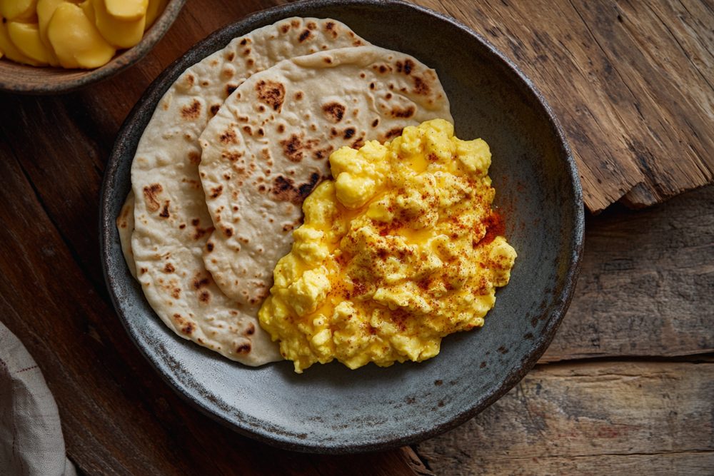 Ethiopian Egg Firfir-less Skillet, Almond Flatbread Base, plated and ready to serve