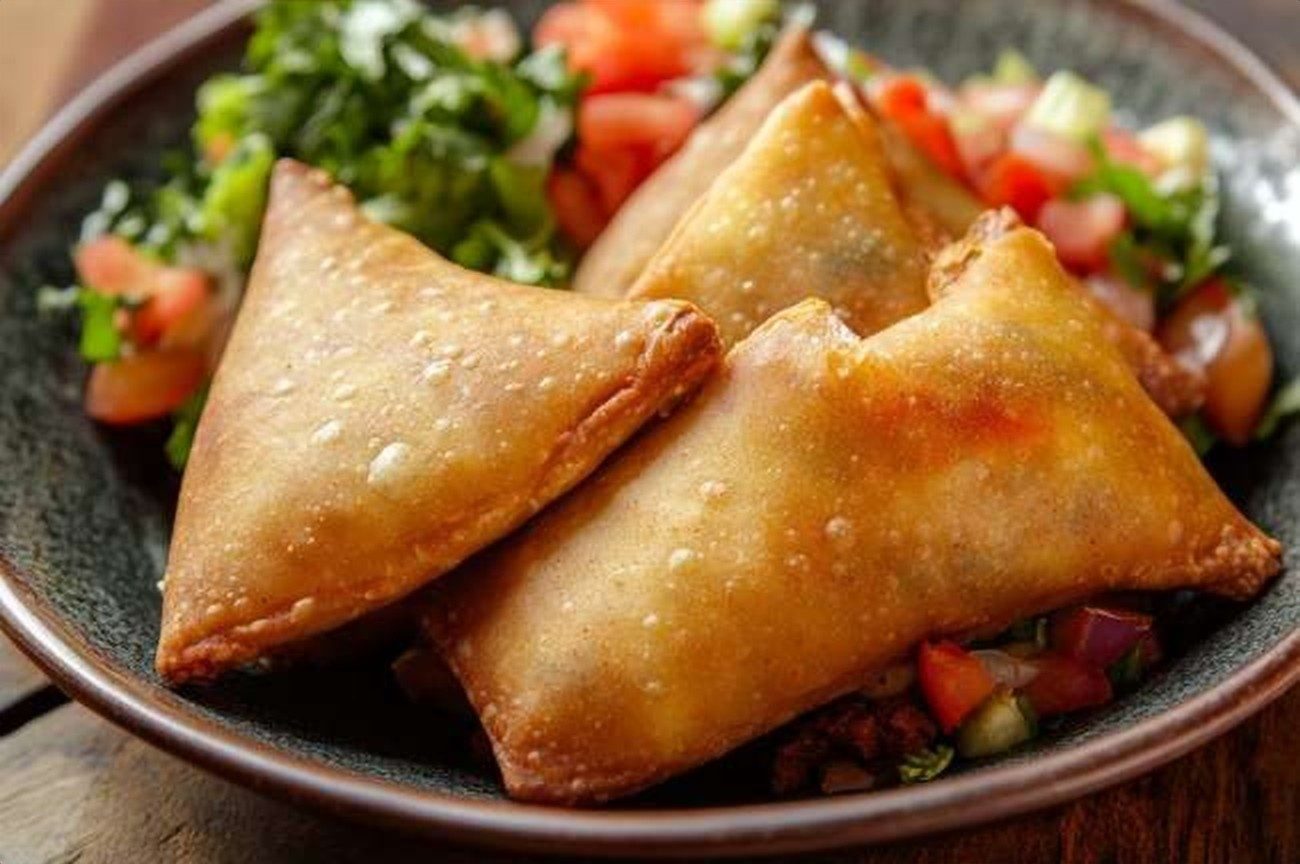 Ethiopian Sambusa, Almond Flour Crust, Meat Filling, plated and ready to serve